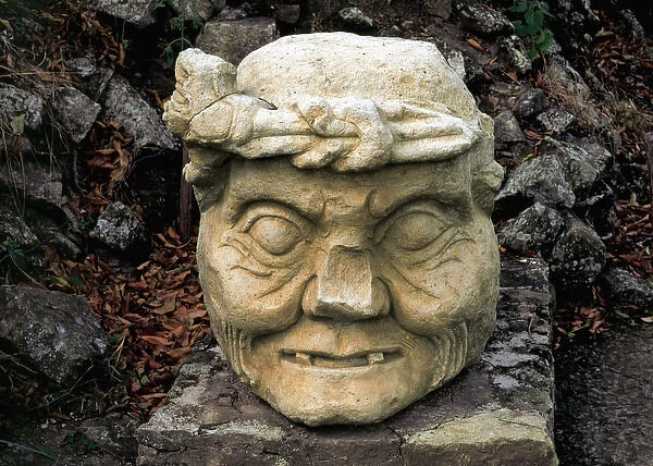 Archaeological Site of Copan. Stone head of an old man. Hond