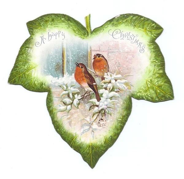Christmas card in the shape of a green leaf with robins
