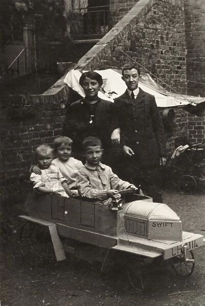 Family photo with children in Go-cart