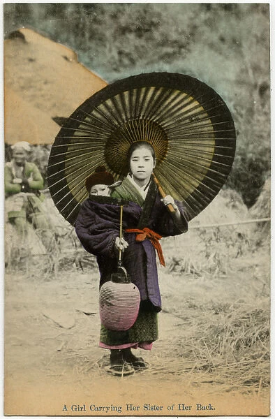 Japan - Girl carrying her younger sister on her back