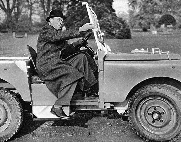 King George VI climbing into a Land Rover