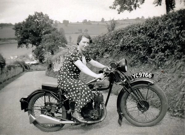 Lady on a 1929 Royal Enfield motorcycle