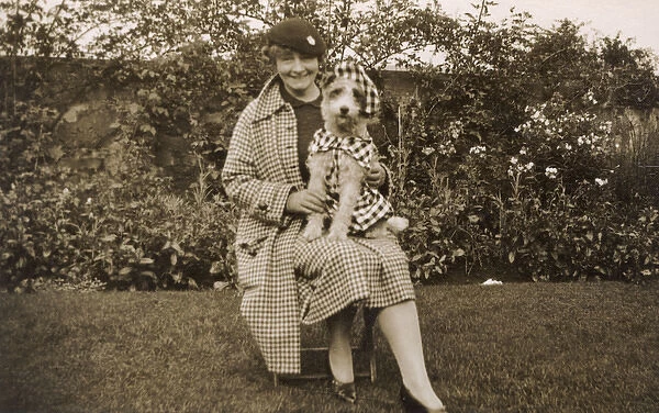 Lady with dog in fancy dress