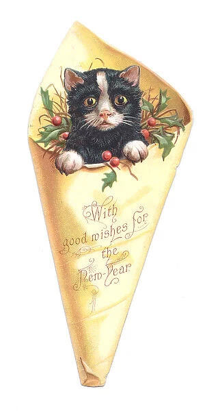 New Year card in the shape of a kitten in wrapping paper