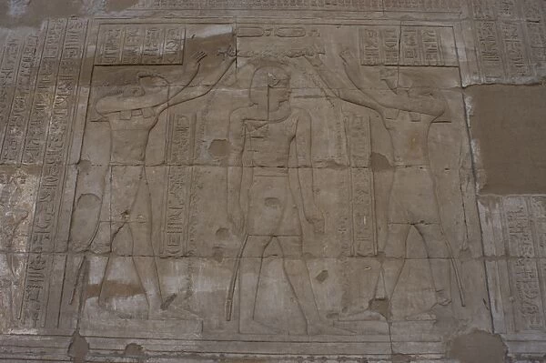 Relief depicting gods Horus and Thoth blessing a Ptolemaic p