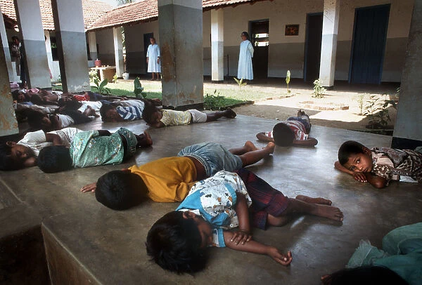 Small children take a nap during the afternoon, Sri Lanka