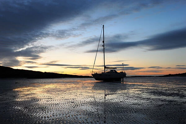 Yacht Moonshadow on beach at Carrick, Dumfries and Galloway
