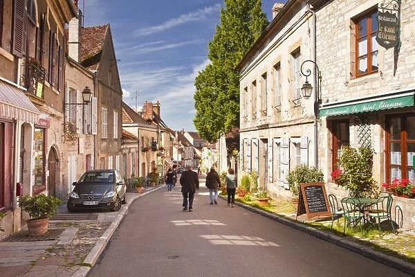 Looking down the main street in the hilltop village of Vezelay in the Yonne area of Burgundy, France, Europe