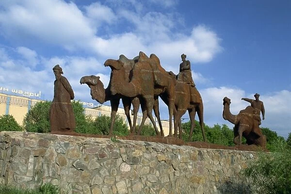 Statues of camels and camel drivers on Silk Road monument
