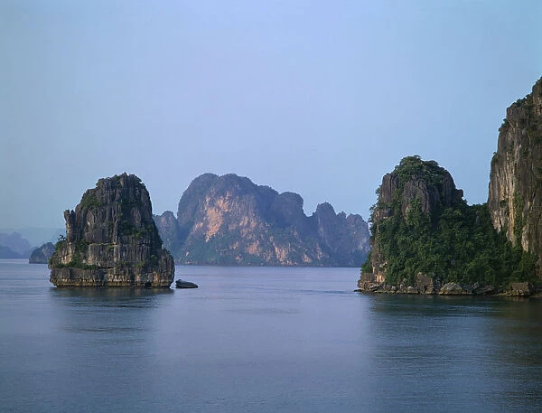 10034385. VIETNAM North Ha Long Bay Karst limestone islands rising