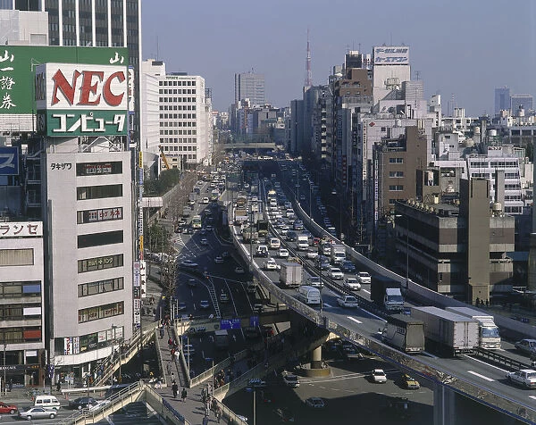 20013588. Japan, Honshu, Tokyo, Shibuya district with busy traffic on elevated motorway