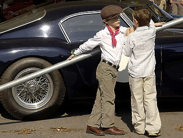 Goodwood Revival Two boys by classic car blue 2000s