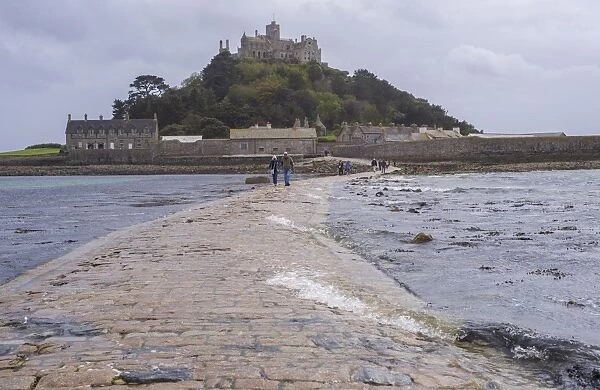 Seawater covering manmade causeway to tidal island, St. Michaels Mount, Mounts Bay, Marazion, Cornwall, England, May