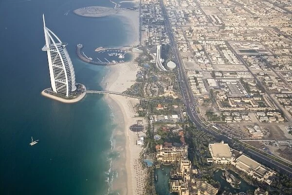 UAE, Dubai. Aerial image of Burj al Arab Hotel and surrounding neighborhood