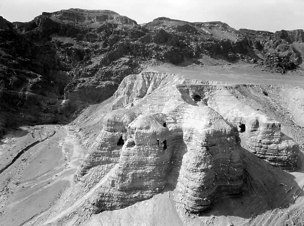 QUMRAN CAVES, c1955. Exterior of the Qumran caves, in which the Dead Sea Scrolls