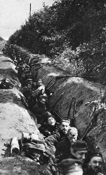 WORLD WAR I: BELGIUM. A long line of Belgian troops in a trench during World War I