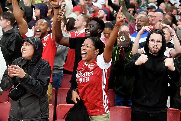 Arsenal Fans Celebrate at Emirates Stadium: Arsenal FC vs Fulham FC, Premier League 2023-24