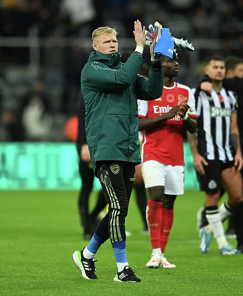 Arsenal's Aaron Ramsdale Celebrates with Fans after Newcastle Victory, 2023-24 Premier League