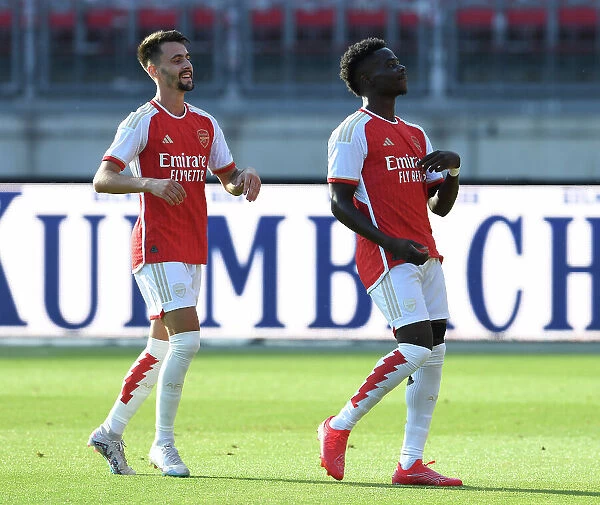 Arsenal's Bukayo Saka and Fabio Vieira Celebrate Goal in Nuremberg Friendly, 2023