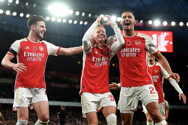 Arsenal's Triumph: Zinchenko, Rice, and Saliba's Euphoric Celebration after Scoring the Third Goal vs Burnley (2023-24)