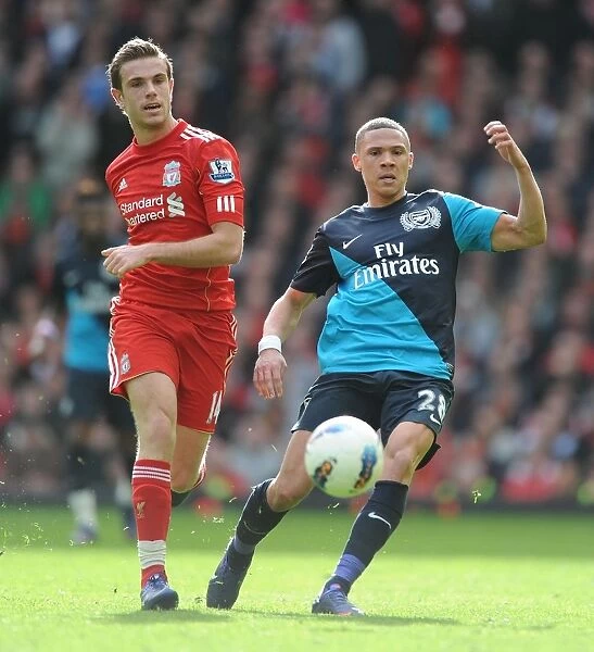 Kieran Gibbs vs. Jordan Henderson: Intense Battle at Anfield - Liverpool vs. Arsenal, Premier League 2011-12