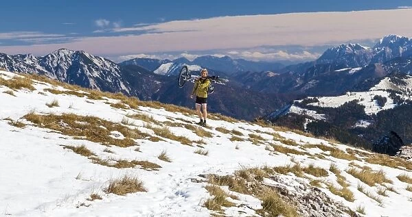 A mountain biker on Schafbergspitze in Austria