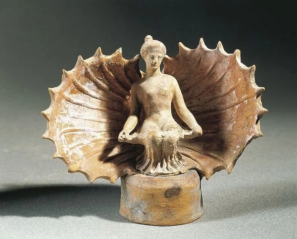 Goddess Aphrodite born from the sea in a shell, terracotta sculpture
