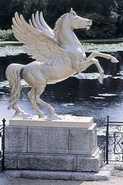 Ireland, County Wicklow, near Enniskerry, Powerscourt, Pegasus statue by a pond, close-up