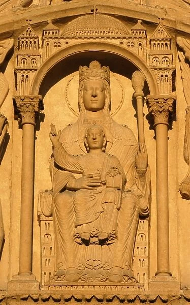 Notre Dame of Paris cathedral Santa Anns gate Virgin and child Jesus holding a bible and blessing the world
