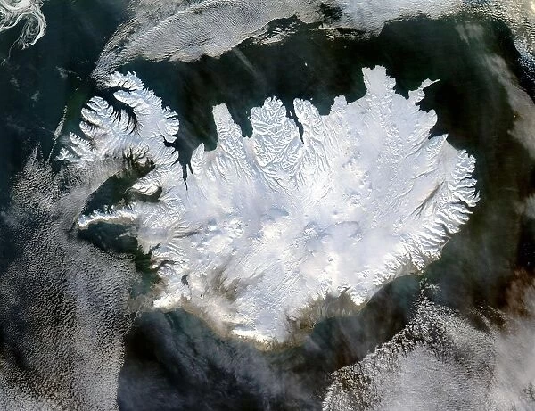 Satellite image of Iceland on 28 January 2004 showing it covered in a blanket of snow