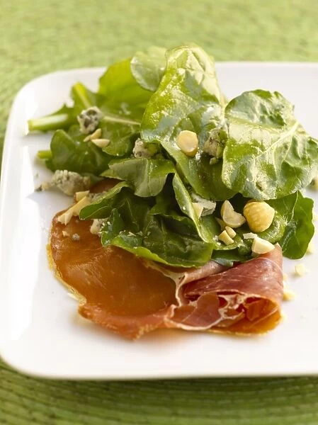 Serrano ham and rocket salad with hazelnut and cabrales cheese vinagrette