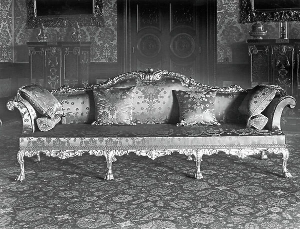 A Sofa from a set of giltwood drawing room furniture, Alnwick Castle, Northumberland, from The English Country House (b / w photo)