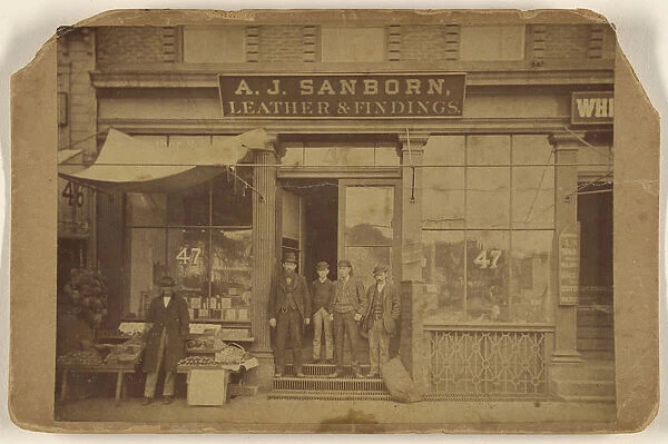 Five men posing front establishment A. J Sanborn