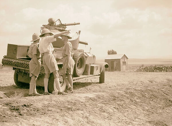 R. A. F activities Armoured car officer giving