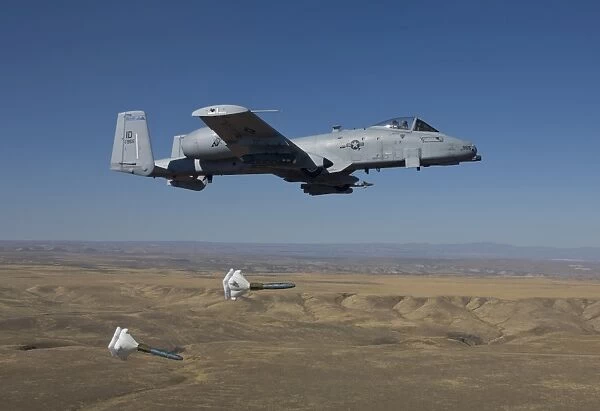 An A-10C Thunderbolt releases two High Drag BDU-50s over Idaho