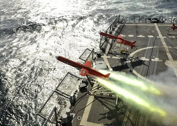 A BQM-74E aerial drone launches from the guided-missile frigate USS Thach