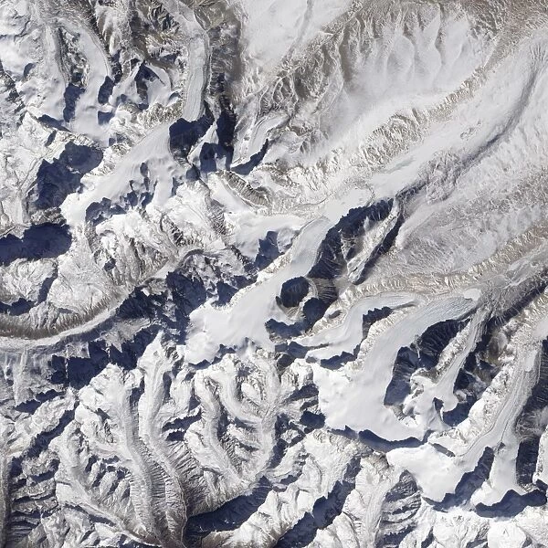 Satellite view of a Himalayan glacier surrounded by mountains