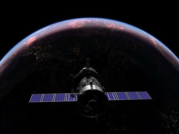 A Soyuz TMA-M spacecraft soars over the Atlantic Ocean at sunset