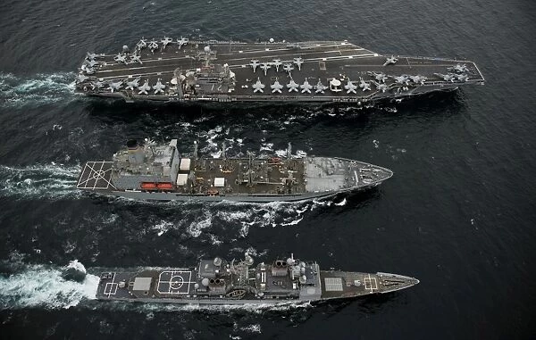 U. S. Navy ships conduct a replenishment at sea in the Pacific Ocean