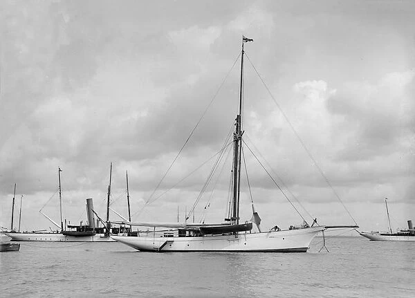 The cutter Yolande at anchor, 1912. Creator: Kirk & Sons of Cowes