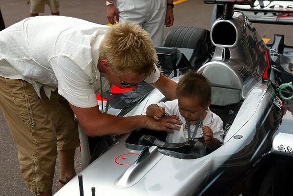 Formula One World Championship: Mika Salo with his son Max Salo