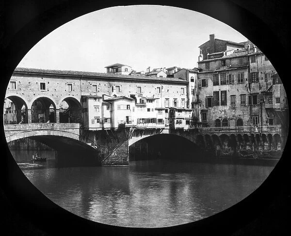 Magic Lantern Slide Circa 1900. victorian. pont Vecchio Bridge. the Ponte Vecchio Is A Medieval Stone Closed-Spandrel Segmental Arch Bridge Over The Arno River, In Florence, Italy, Noted For Still Having Shops Built Along It, As Was Once Common. Butchers Initially Occupied The Shops; The Present Tenants Are Jewelers, Art Dealers And Souvenir Sellers