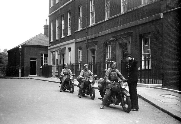 4th September 1939, Army Dispatch riders seen here getting directions from the policeman