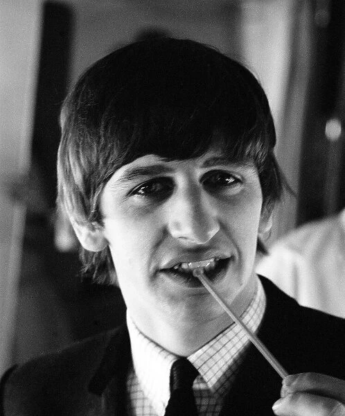 7 February 1964 Ringo Starr on the aircraft to New York