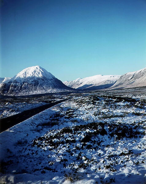 General view showing Buchaille Etive Mhor Pass of Glencoe in winter, 1981