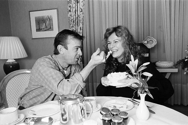 Having tea at St James Club are Julie Walters and Ian Charleson. 6th February 1986