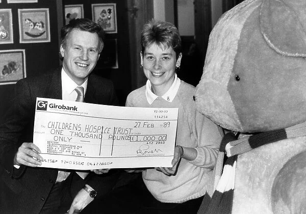 Lowry Stanage, British Telecoms West Midlands General Manager presents £1
