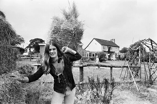 Ozzy Osbourne of Black Sabbath farming at his staffordshire home. 28th July, 1976