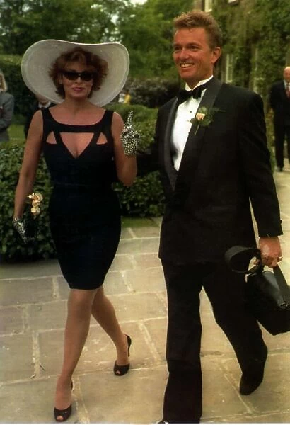 Raquel Welch Actress with boyfriend Bob Moore arriving for her sons wedding