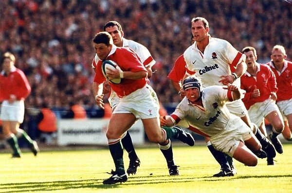 Rugby - Wales v England - Wembley Stadium - Scott Gibbs makes the break to score his